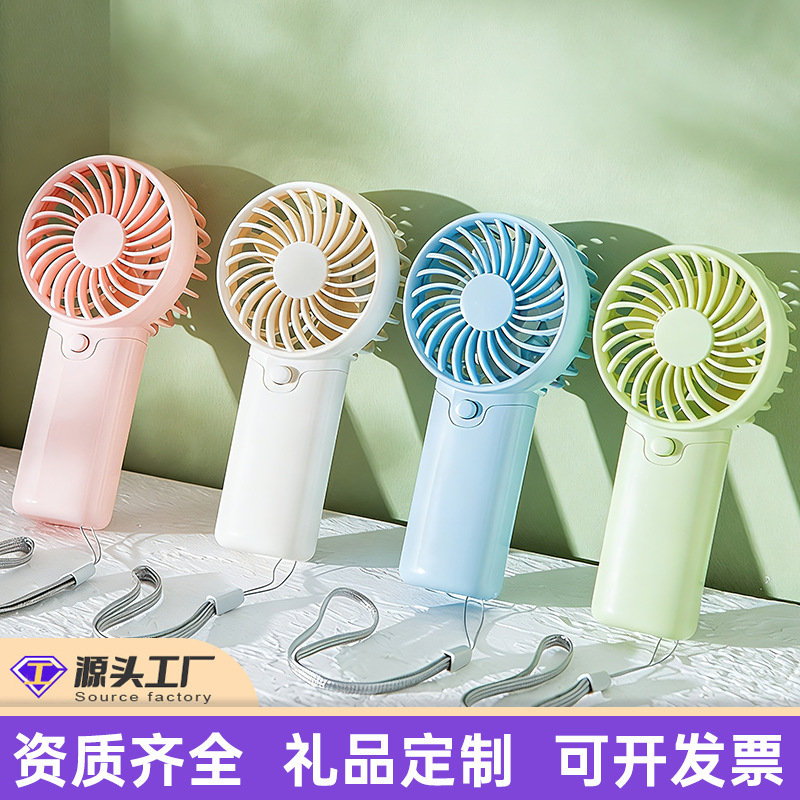 Cross-border Best-selling Handheld Mini Fan (Dry Battery Version) with Custom Logo, High Wind Power, Portable and Handy Electric Fan Gift