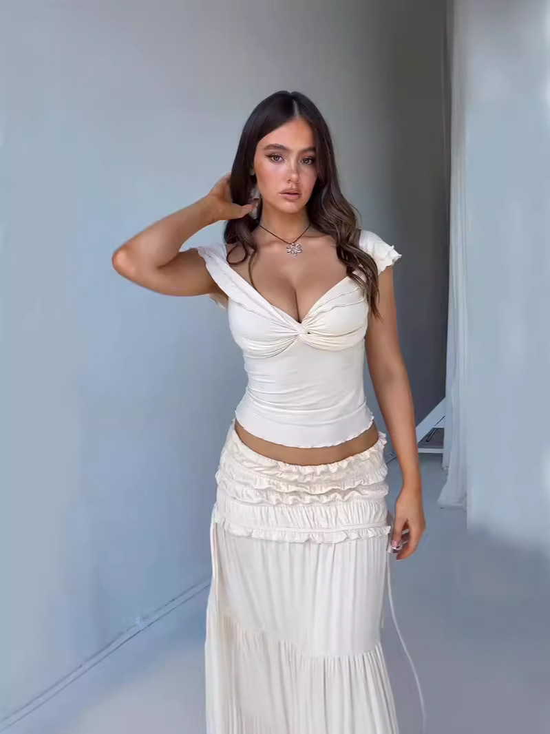Summer new style women's navel-baring low-cut short vest with French style pleated skirt set