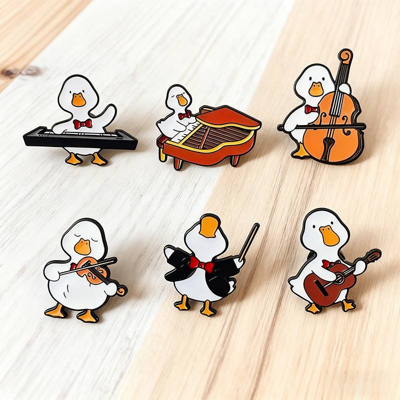 Cartoon duck band brooch, creative piano, cello, and violin, cute animal music element badge pin